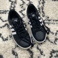 Black Women’s size 9.5M Adidas shell toes. Barely worn!
